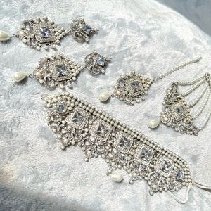 NEW Jewelry with a choker necklace, earrings, tikka, and jhumar in silver
